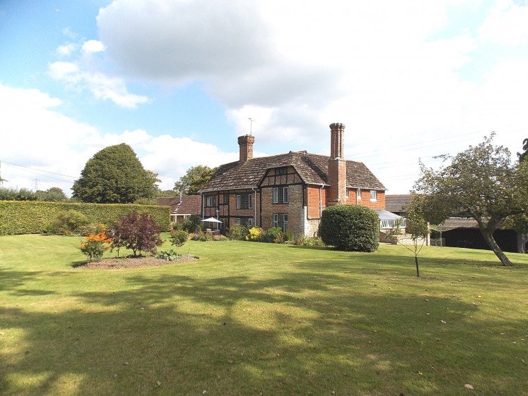 Listed farmhouse and buildings