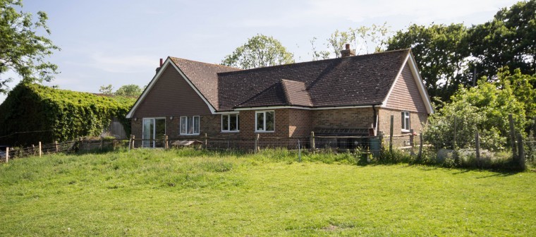 Oast and barn with farm buildings